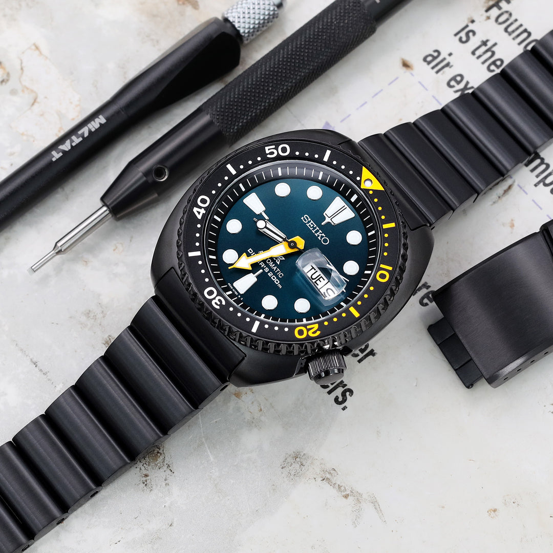SEIKO精工限量黑鮑魚SRPC49專用彎錶耳代用實心"子彈"鋼錶帶電鍍黑V形雙鎖錶帶扣